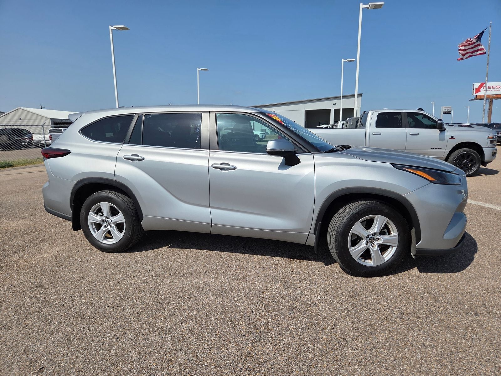 2024 Toyota Highlander — rear three-quarter view