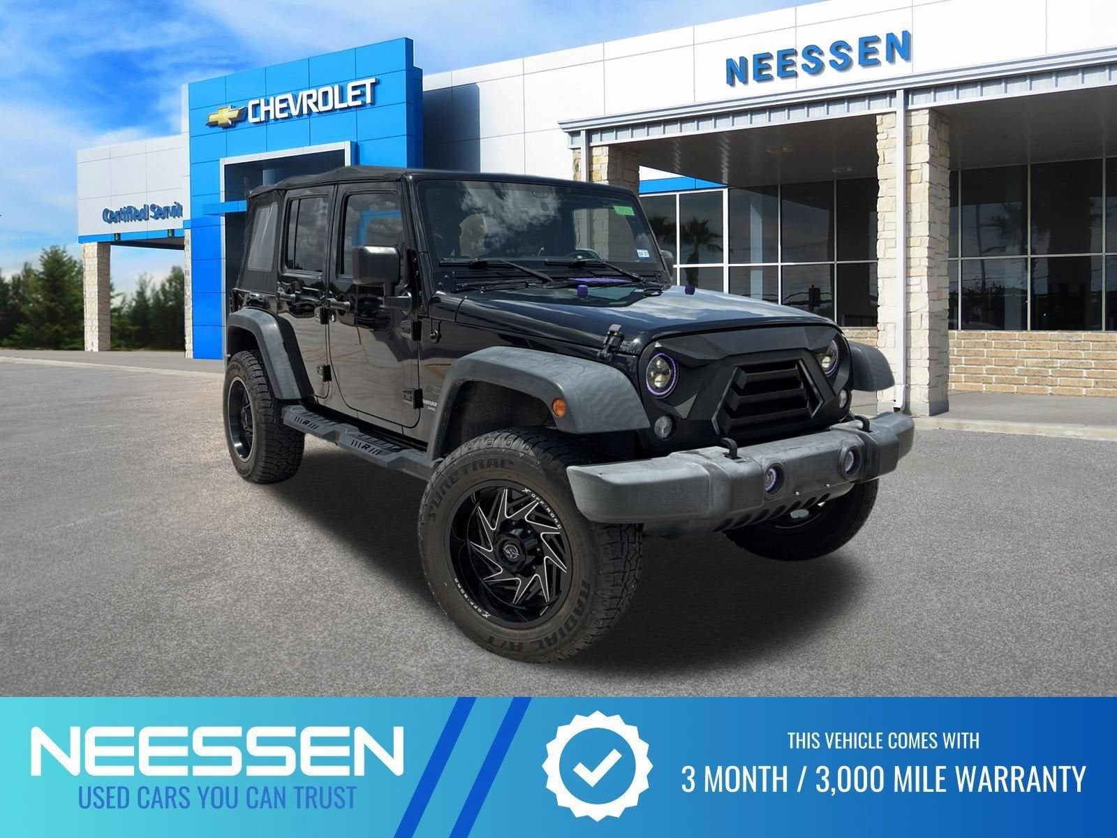 2017 Jeep Wrangler Unlimited Sport in Black Clearcoat — front three-quarter view