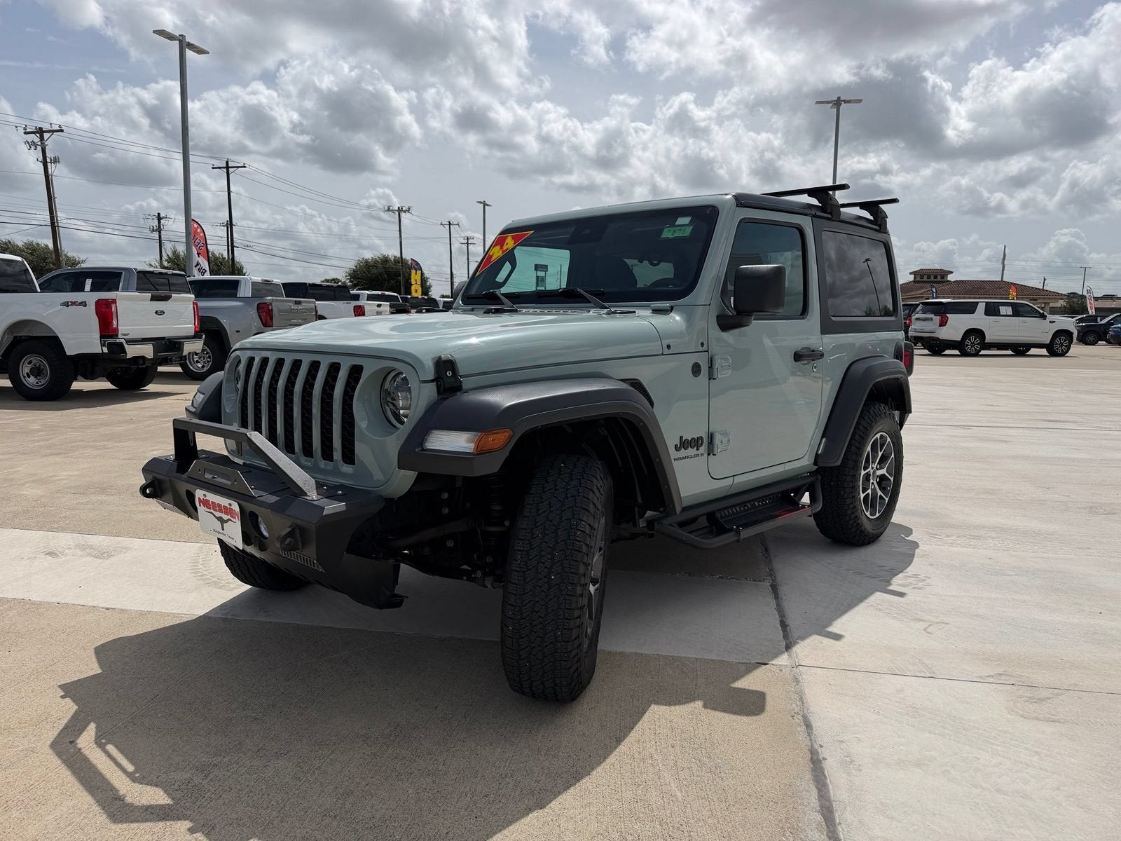 2024 Jeep Wrangler — rear three-quarter view