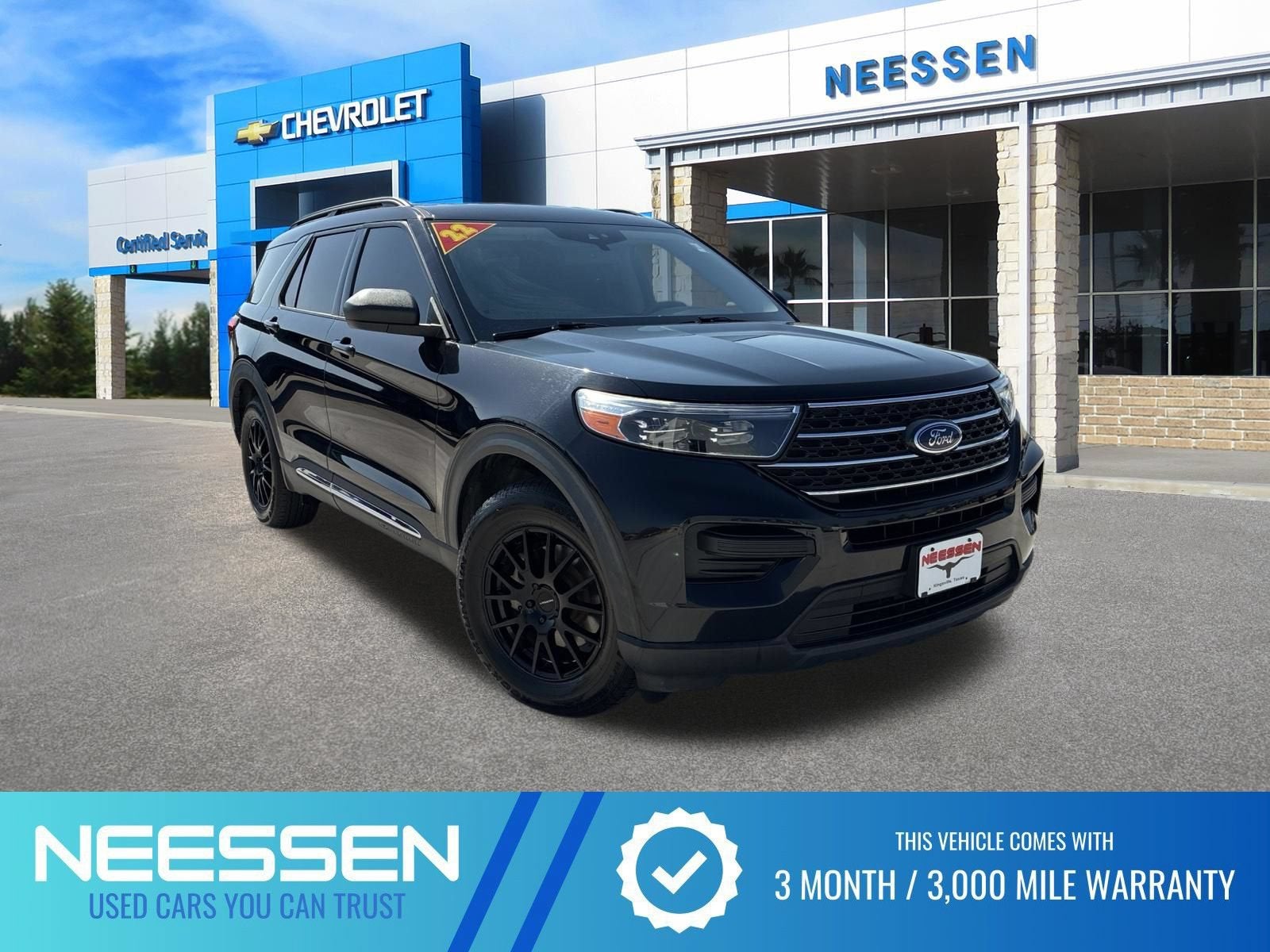 2022 Ford Explorer XLT in Agate Black Metal — front three-quarter view
