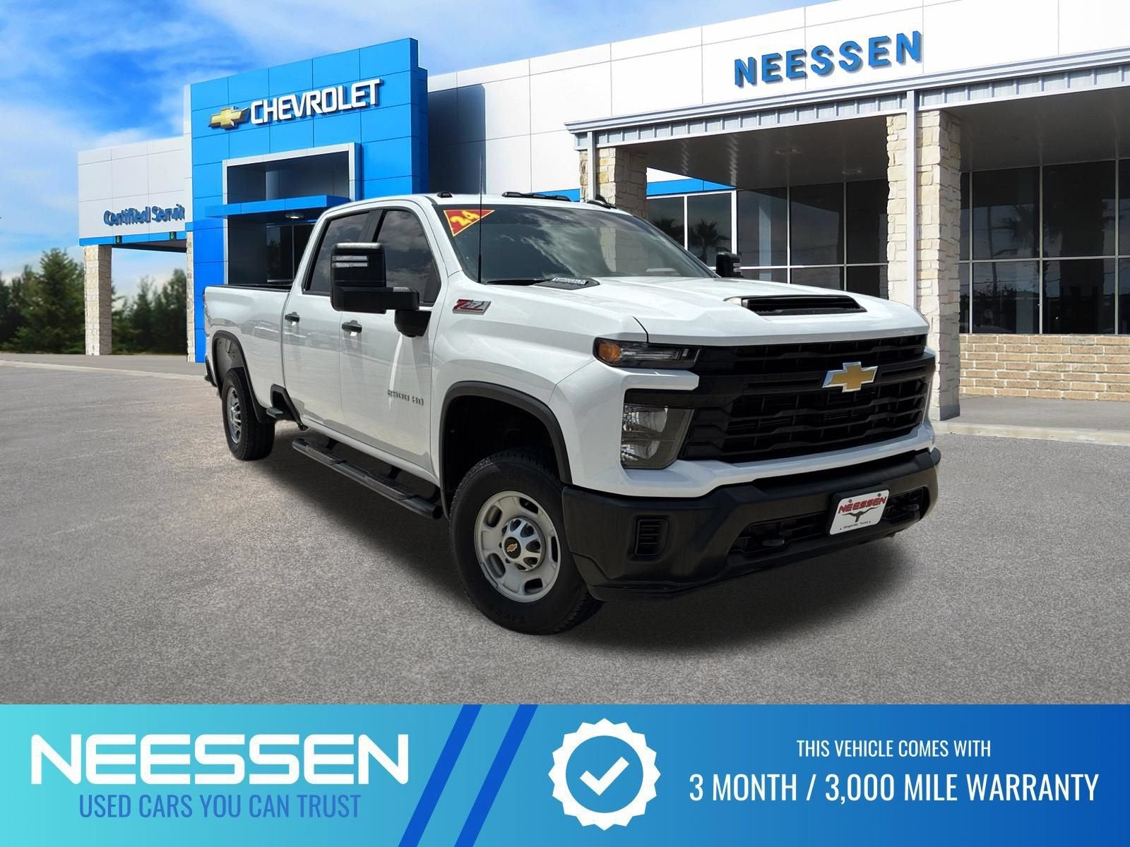 2024 Chevrolet Silverado 2500 HD WT in Summit White — front three-quarter view
