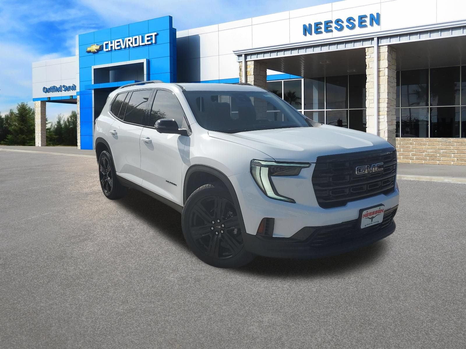 2026 GMC Acadia Elevation in Summit White — front three-quarter view