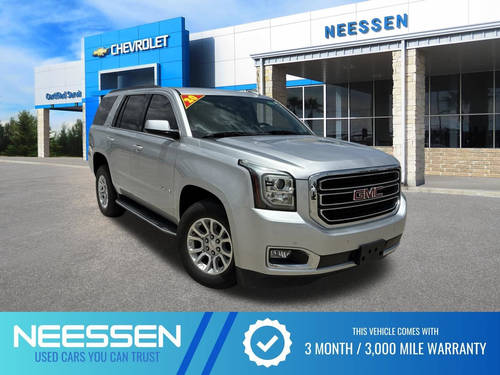 2020 GMC Yukon SLE in Quicksilver Metallic — front three-quarter view