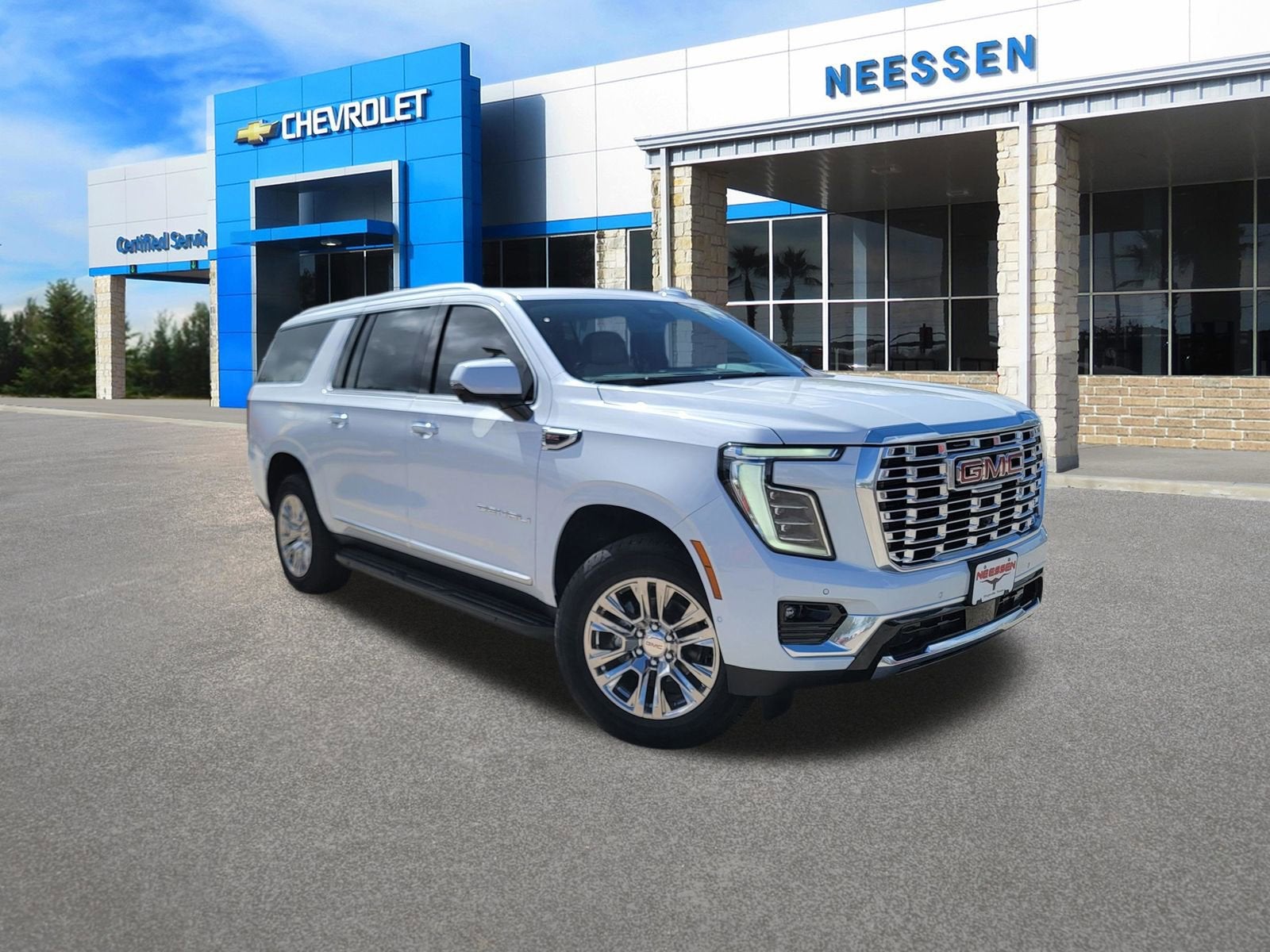 2026 GMC Yukon XL Denali in Glacier White Tricoat — front three-quarter view
