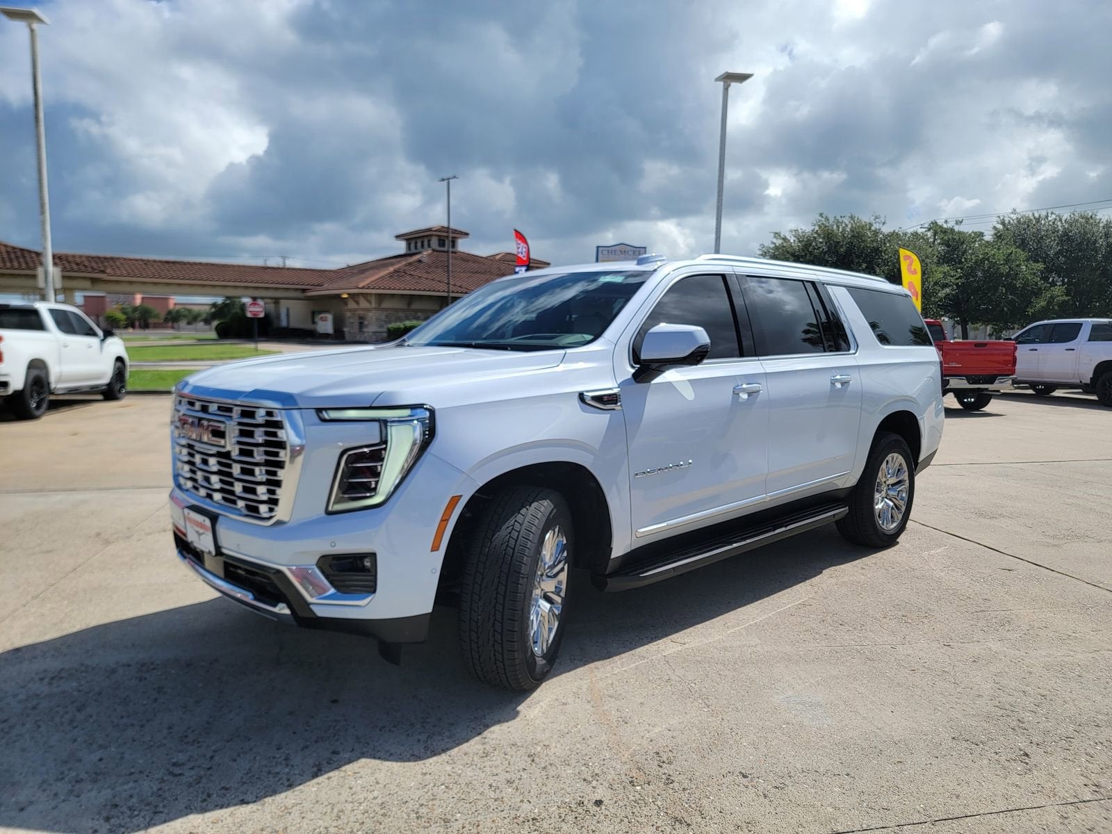 2026 GMC Yukon XL — rear three-quarter view