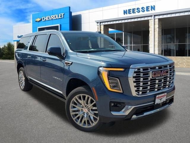 2026 GMC Yukon XL Denali in Downpour Metallic — front three-quarter view