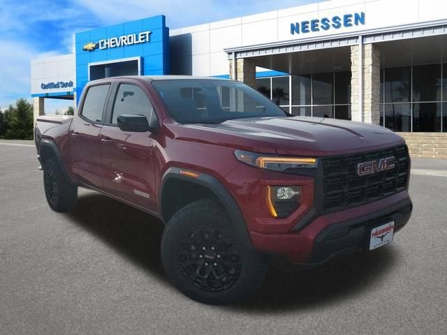 2026 GMC Canyon Elevation in Volcanic Red Tintcoat — front three-quarter view