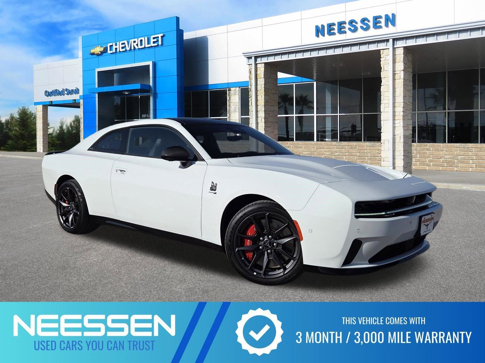 2024 Dodge Charger Daytona Scat Pack in White Knuckle — front three-quarter view