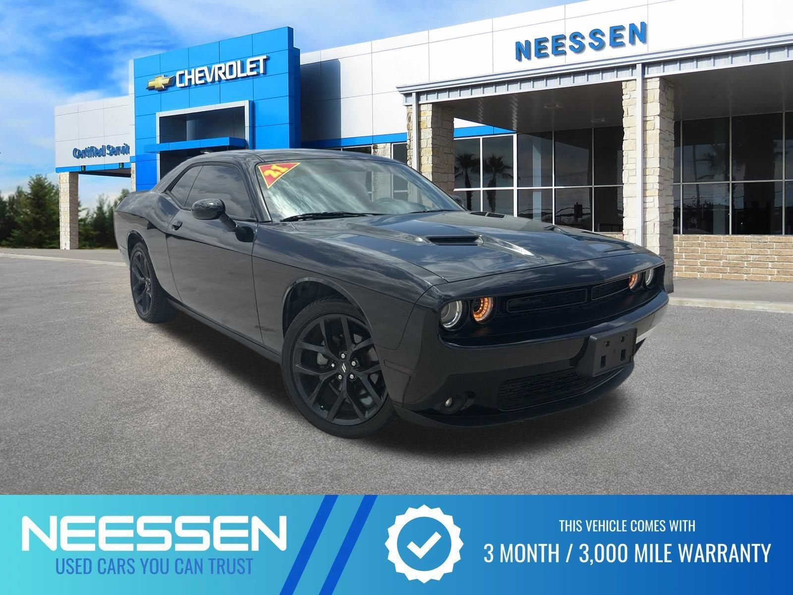 2021 Dodge Challenger SXT in Pitch Black Cle — front three-quarter view