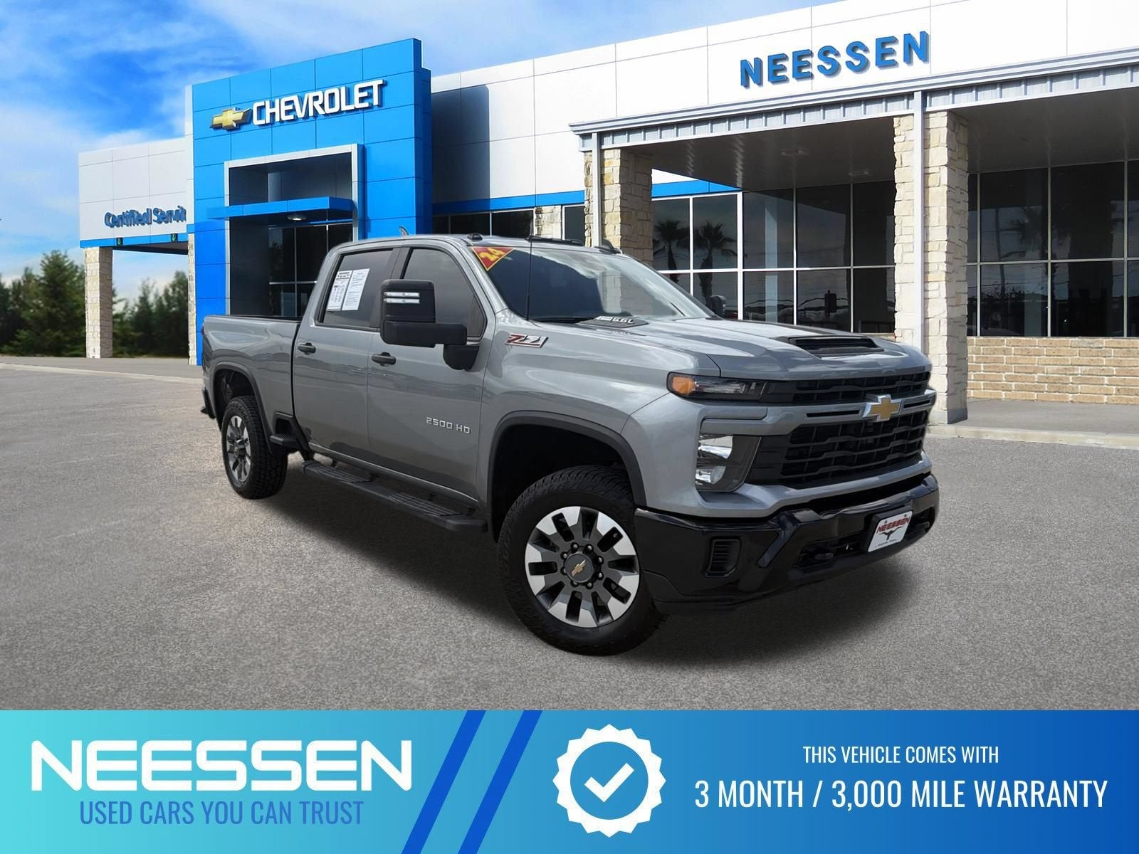 2024 Chevrolet Silverado 2500 HD Custom in Sterling Gray Metallic — front three-quarter view