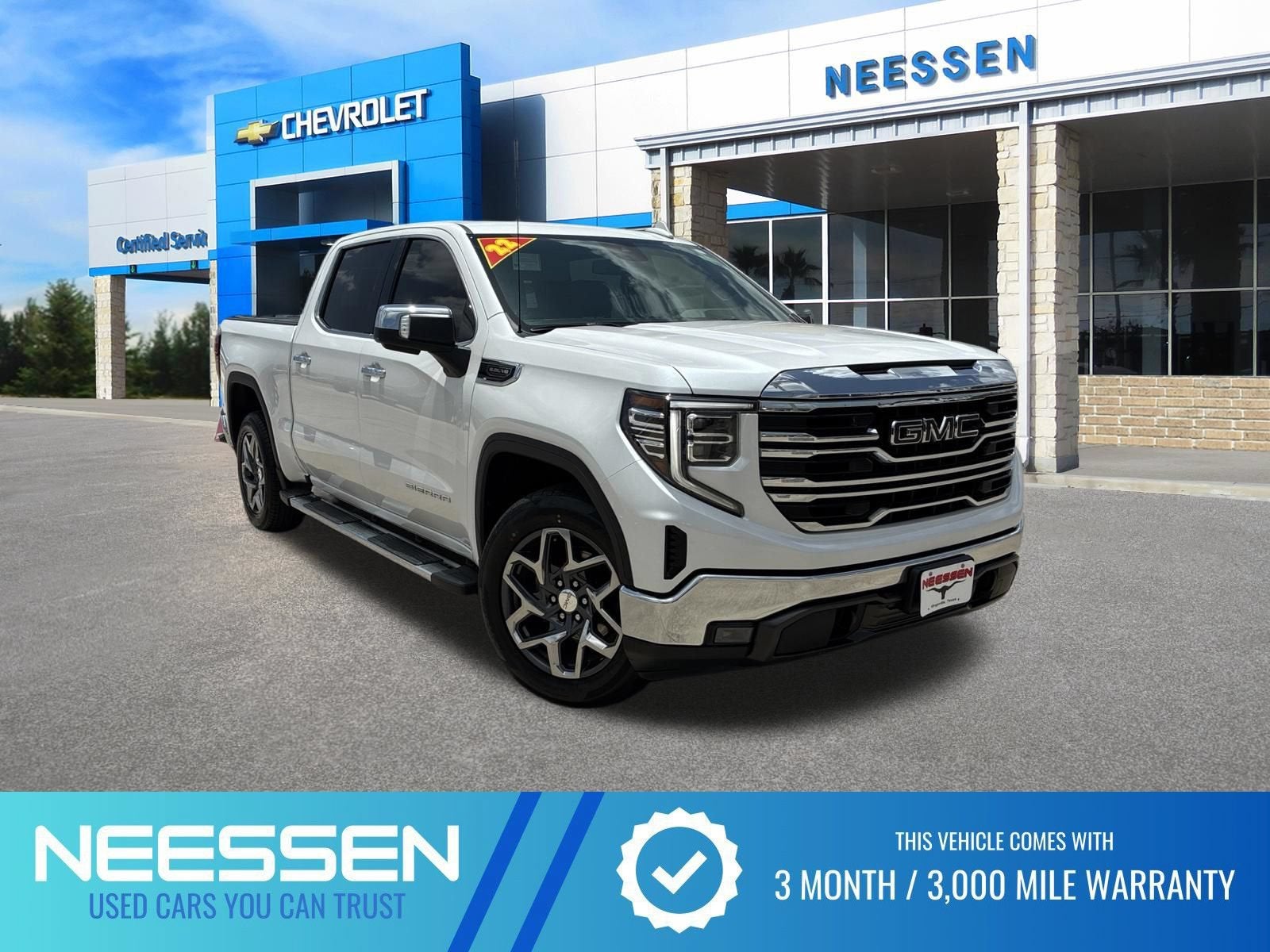 2022 GMC Sierra 1500 SLT in White Frost Tricoat — front three-quarter view