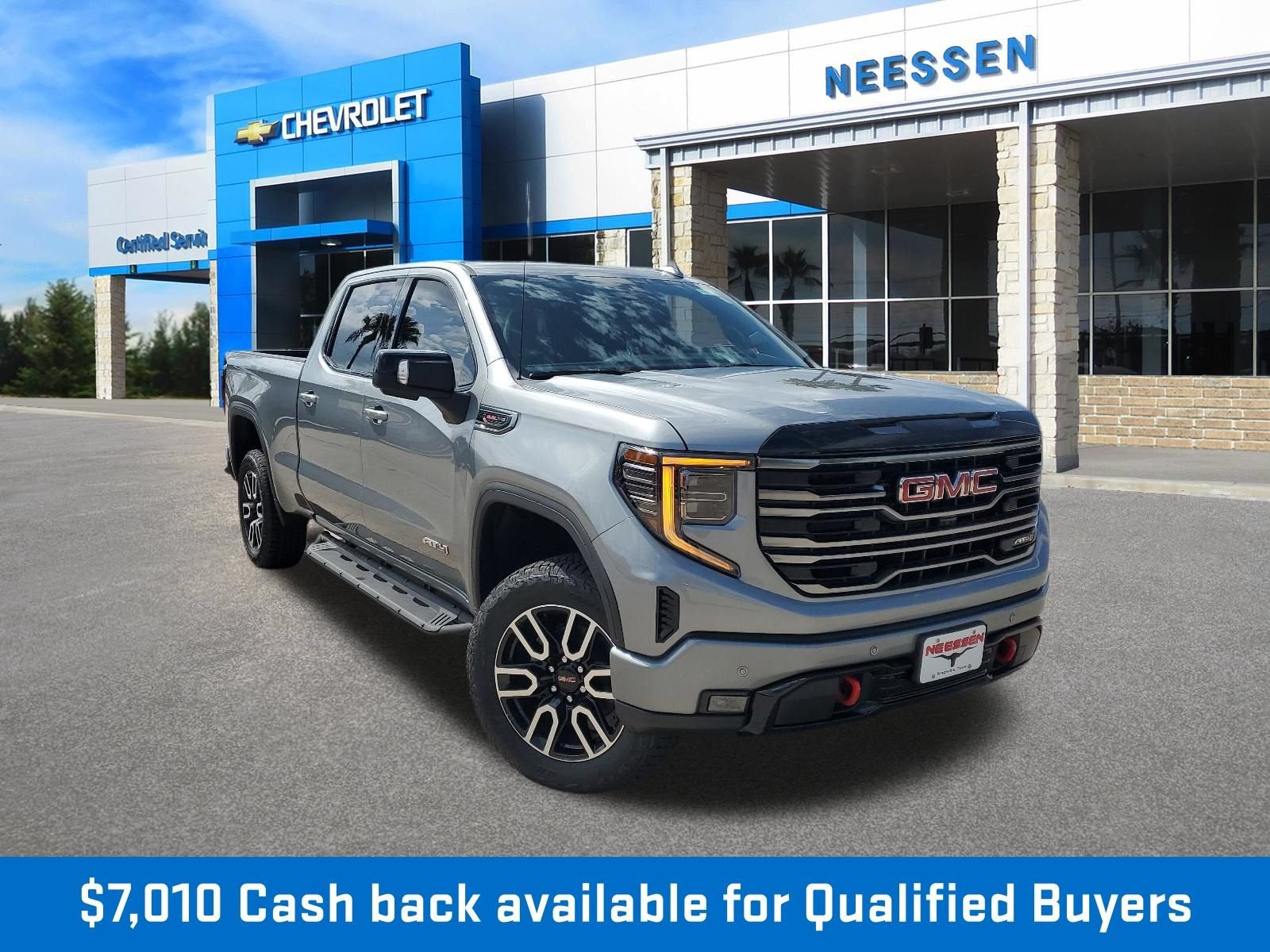 2026 GMC Sierra 1500 AT4 in Sterling Metallic — front three-quarter view
